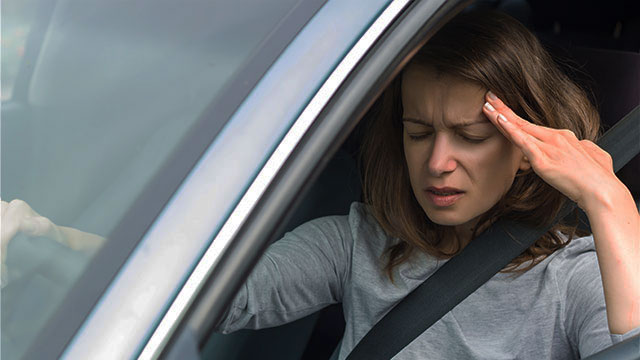 pateint with headache needing auto accident chiropractor in Napa
