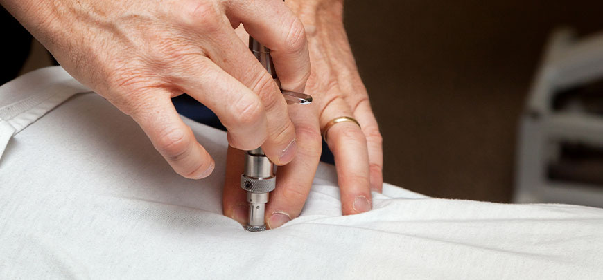 patient receiving activator methods technique in Napa for auto accident injury relief